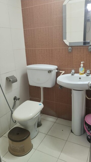Bathroom in 3 BHK Apartment at Mahagun Mascot, Sain Vihar – for Sale
