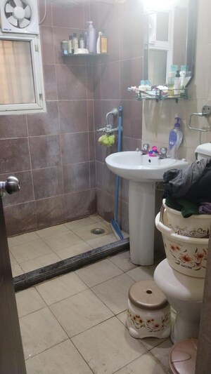 Bathroom in 3 BHK Apartment at Mahagun Mascot, Sain Vihar – for Sale