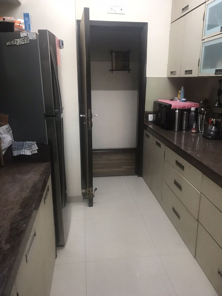 Kitchen, oberoi-realty-woods 2.5 Bedroom 900 Sq.Ft. Apartment In Goregaon East Mumbai 9390075