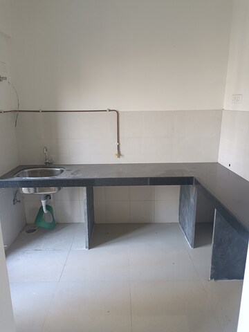 Kitchen in 1 BHK Apartment at Ashar Metro Towers, Vartak Nagar – for Sale