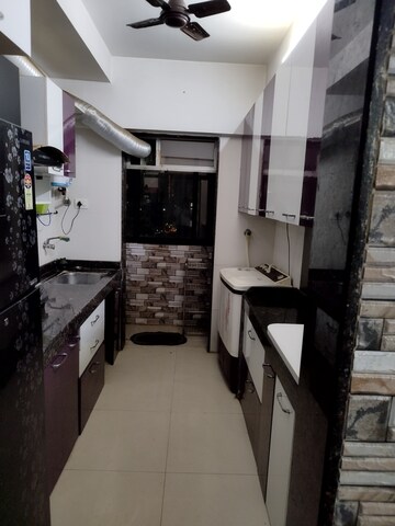 Kitchen in 2 BHK Apartment at M R Galaxy Royale, Goregaon West – for Rent