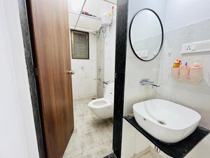 Bathroom in 2 BHK Apartment at Mika Triton Residency, Wadgaon Sheri – for Sale