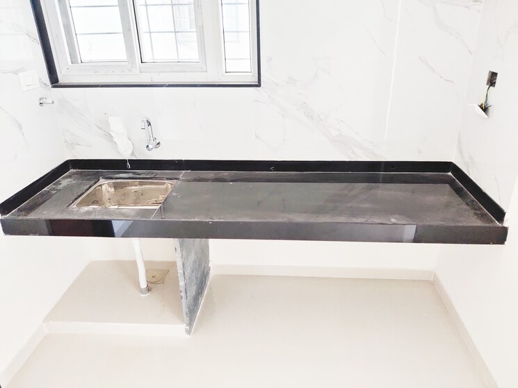 Kitchen, guru-vista-chs 2 Bedroom 856 Sq.Ft. Apartment In Kharadi Pune 9390190