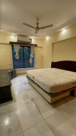 Bedroom in 3 BHK Apartment at Belscot Chs Ltd, Andheri West – for Rent