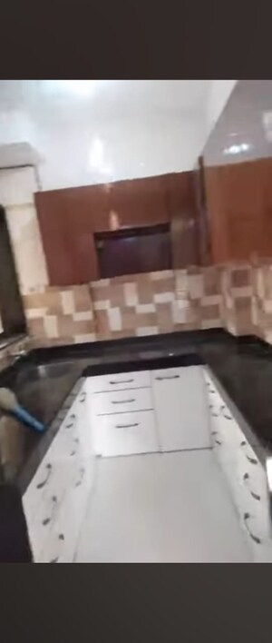 Kitchen in 2 BHK Apartment at Ahimsa Marg, Malad West – for Rent