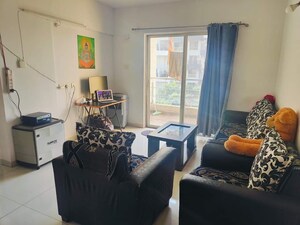 Living Room in 1 BHK Apartment at Kolte Patil Xenia, Kharadi – for Rent