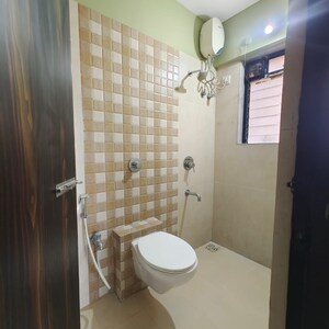 Bathroom in 1 BHK Apartment at Raunak Unnathi Woods Phase 6, Kasarvadavali – for Sale