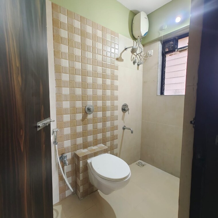 Bathroom, raunak-unnathi-woods-phase-6 1 Bedroom 445 Sq.Ft. Apartment In Kasarvadavali Thane 9390329