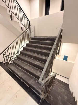 Staircase in 3.5 BHK Apartment at Smart World Gems, Sector 89 – for Rent