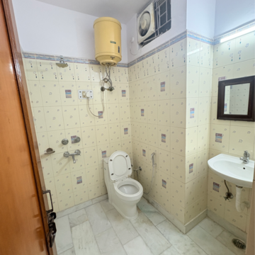 Bathroom in 2 BHK Builder Floor at Khirki Extension – for Rent