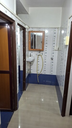 Master Bedroom in 1 RK Apartment at Nagari Niwara CHS, Goregaon East – for Rent