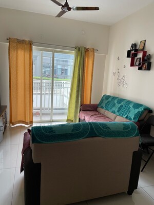 Living Room in 2 BHK Apartment at Megapolis Township, Hinjewadi – for Rent