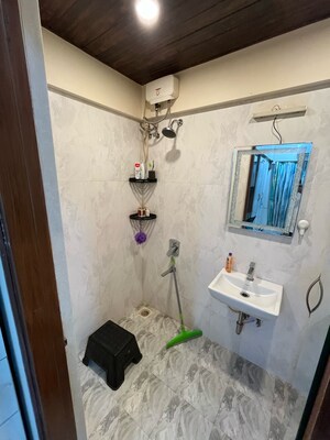 Bathroom in 1 BHK Apartment at Romell Amore, Andheri West – for Sale