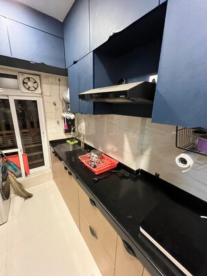 Kitchen in 1 BHK Apartment at Romell Amore, Andheri West – for Sale
