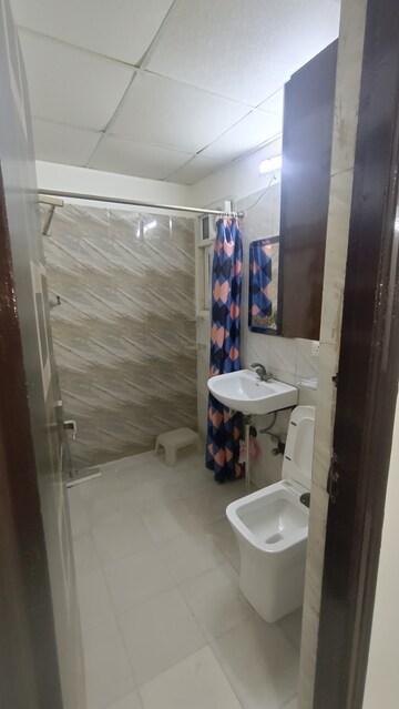 Bathroom in 2 BHK Apartment at Antriksh Golf View, Sector 78 – for Rent