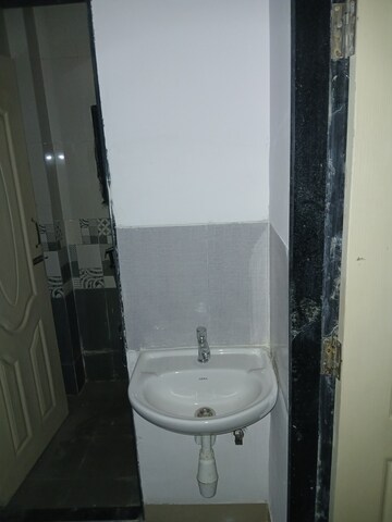 Bathroom in 1 BHK Apartment at Vastukala Niwara CHS, Goregaon West – for Rent