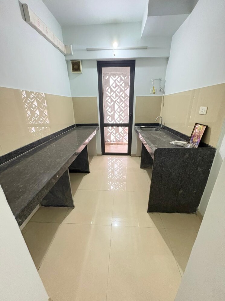 Kitchen, lodha-palava-city-lakeshore-greens 2 Bedroom 734 Sq.Ft. Apartment In Dombivli East Thane 9390663