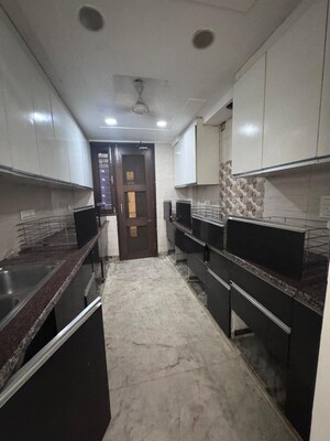 Kitchen in 3 BHK Apartment at Sunder Apartment, Paschim Vihar – for Rent