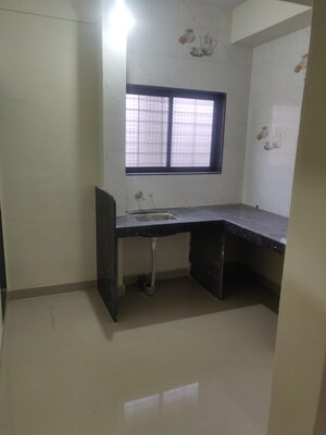 Kitchen in 1 BHK Apartment at Gulmohar Serene, Kharadi – for Rent