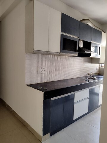 Kitchen in 2 BHK Apartment at Omkar Royal Nest, Tech Zone 4 Greater Noida – for Rent