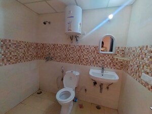 Bathroom in 2 BHK Apartment at Omkar Royal Nest, Tech Zone 4 Greater Noida – for Rent