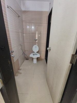 Bathroom in 2 BHK Apartment at Nisarg Hyde Park, Kharghar – for Rent