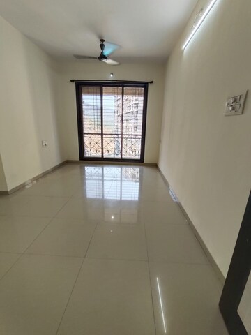Living Room in 2 BHK Apartment at Nisarg Hyde Park, Kharghar – for Rent