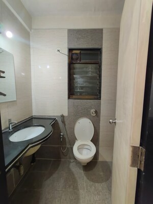 Bathroom in 2 BHK Apartment at Nisarg Hyde Park, Kharghar – for Rent