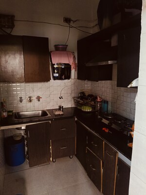 Kitchen in 1 BHK Builder Floor at Dhakoli – for Sale