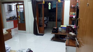 Living Room in 1 BHK Apartment at Runwal Meadows, Warje – for Rent