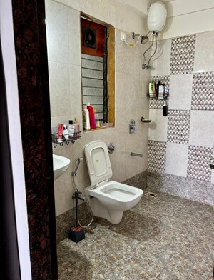 Bathroom in 2 BHK Apartment at Rustomjee Meridian, Kandivali West – for Rent