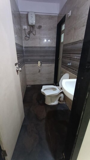 Bathroom in 2 BHK Apartment at Nisarg Hyde Park, Kharghar – for Rent