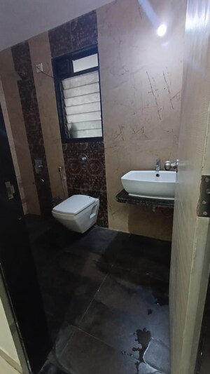 Bathroom in 2 BHK Apartment at Nisarg Hyde Park, Kharghar – for Rent