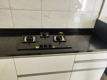 Kitchen in 1 BHK Apartment at Kolte Patil Downtown Xenia, Kharadi – for Rent