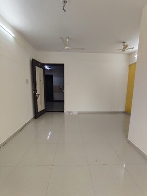 Living Room in 2 BHK Apartment at Nisarg Hyde Park, Kharghar – for Rent