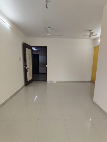 Living Room in 2 BHK Apartment at Nisarg Hyde Park, Kharghar – for Rent