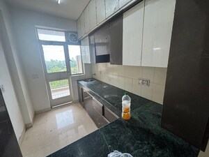 Kitchen in 2 BHK Apartment at Conscient Habitat, Sector 99a – for Rent