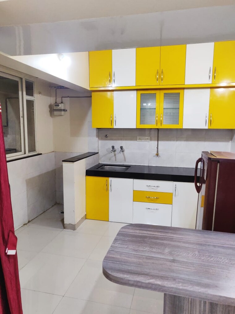 Kitchen, nirman-altius 2 Bedroom 809 Sq.Ft. Apartment In Kharadi Pune 9391212
