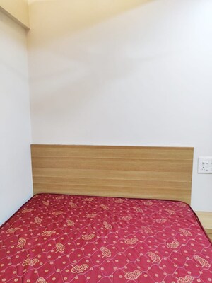 Bedroom in 2 BHK Apartment at Nirman Altius, Kharadi – for Rent
