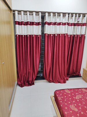 Bedroom in 2 BHK Apartment at Nirman Altius, Kharadi – for Rent