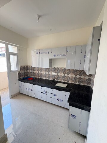 Kitchen in 2 BHK Apartment at Signature The Millennia 3, Sector 37d – for Rent