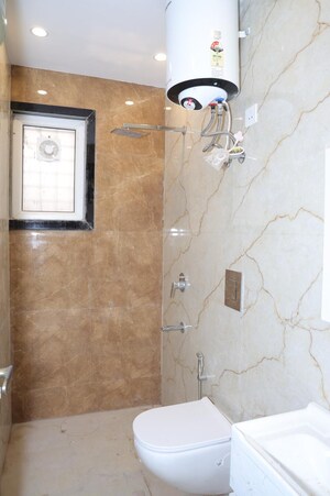 Bathroom in 4 BHK Apartment at Vasant Kunj – for Rent