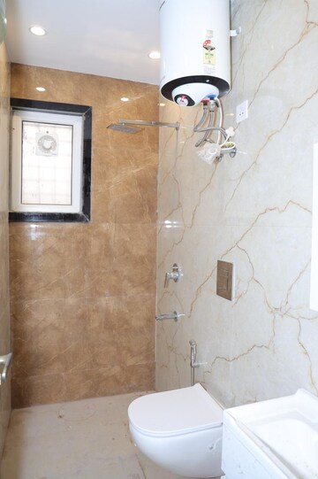 Bathroom in 4 BHK Apartment at Vasant Kunj – for Rent