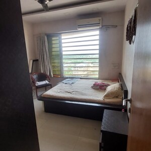 Master Bedroom in 3 BHK Apartment at Waterfront Tropical Panache, Kasarvadavali – for Sale