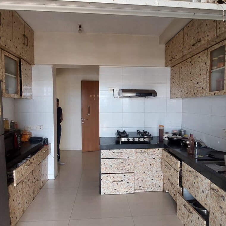 Kitchen, waterfront-tropical-panache 3 Bedroom 1750 Sq.Ft. Apartment In Kasarvadavali Thane 9391402