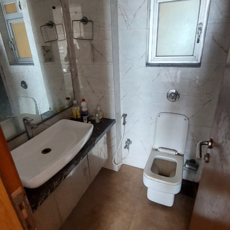 Bathroom, waterfront-tropical-panache 3 Bedroom 1750 Sq.Ft. Apartment In Kasarvadavali Thane 9391402