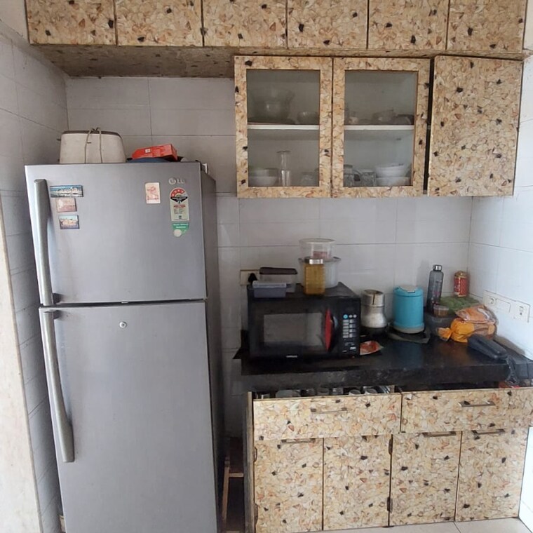 Kitchen, waterfront-tropical-panache 3 Bedroom 1750 Sq.Ft. Apartment In Kasarvadavali Thane 9391402