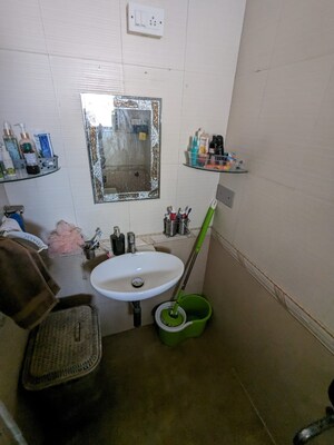 Bathroom in 2 BHK Apartment at Oakland Park, Andheri West – for Sale