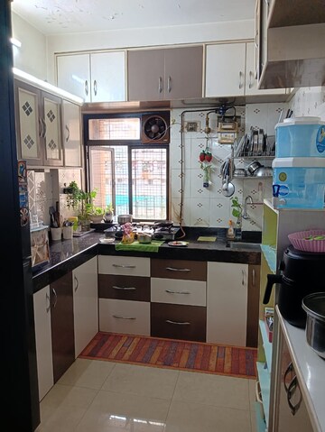 Kitchen in 1 BHK Apartment at Riddhi Garden, Malad East – for Sale
