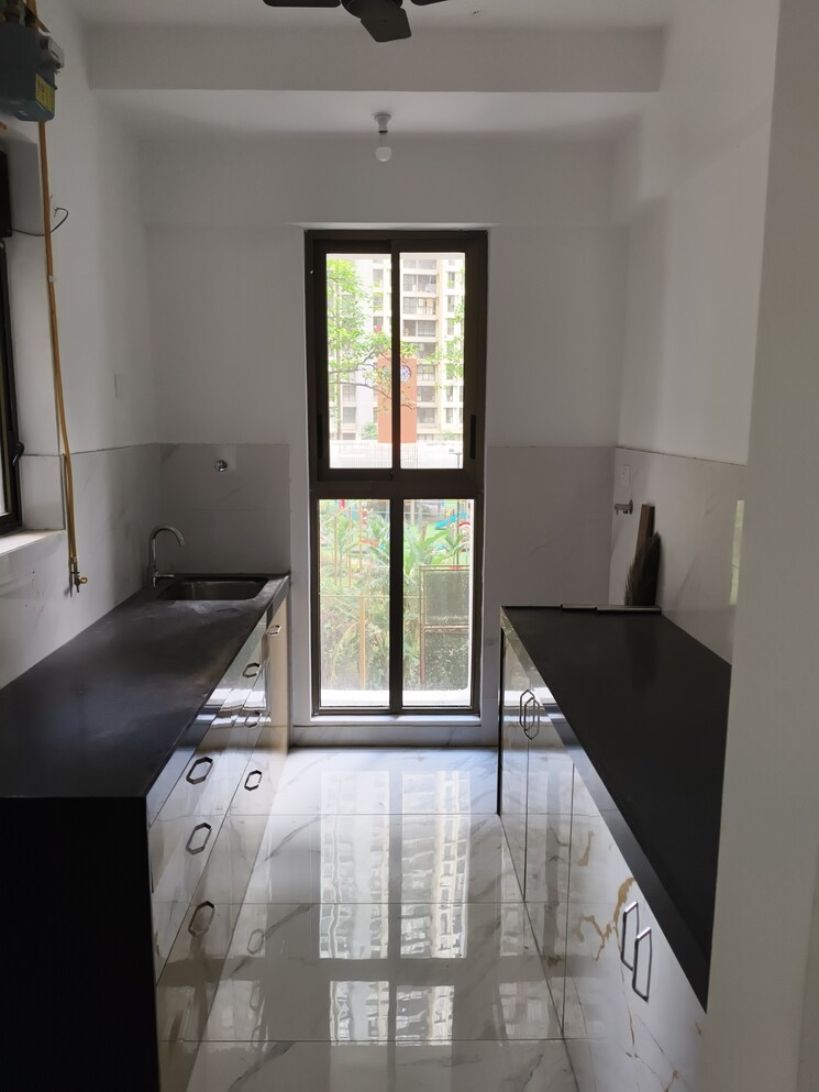 Kitchen, raymond-ten-x-habitat 2 Bedroom 850 Sq.Ft. Apartment In Pokhran Road No Two Thane 9391575